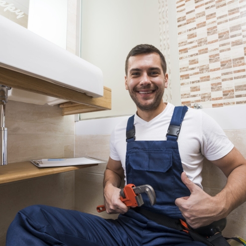 sanitary-technician-gesturing-thumb-up